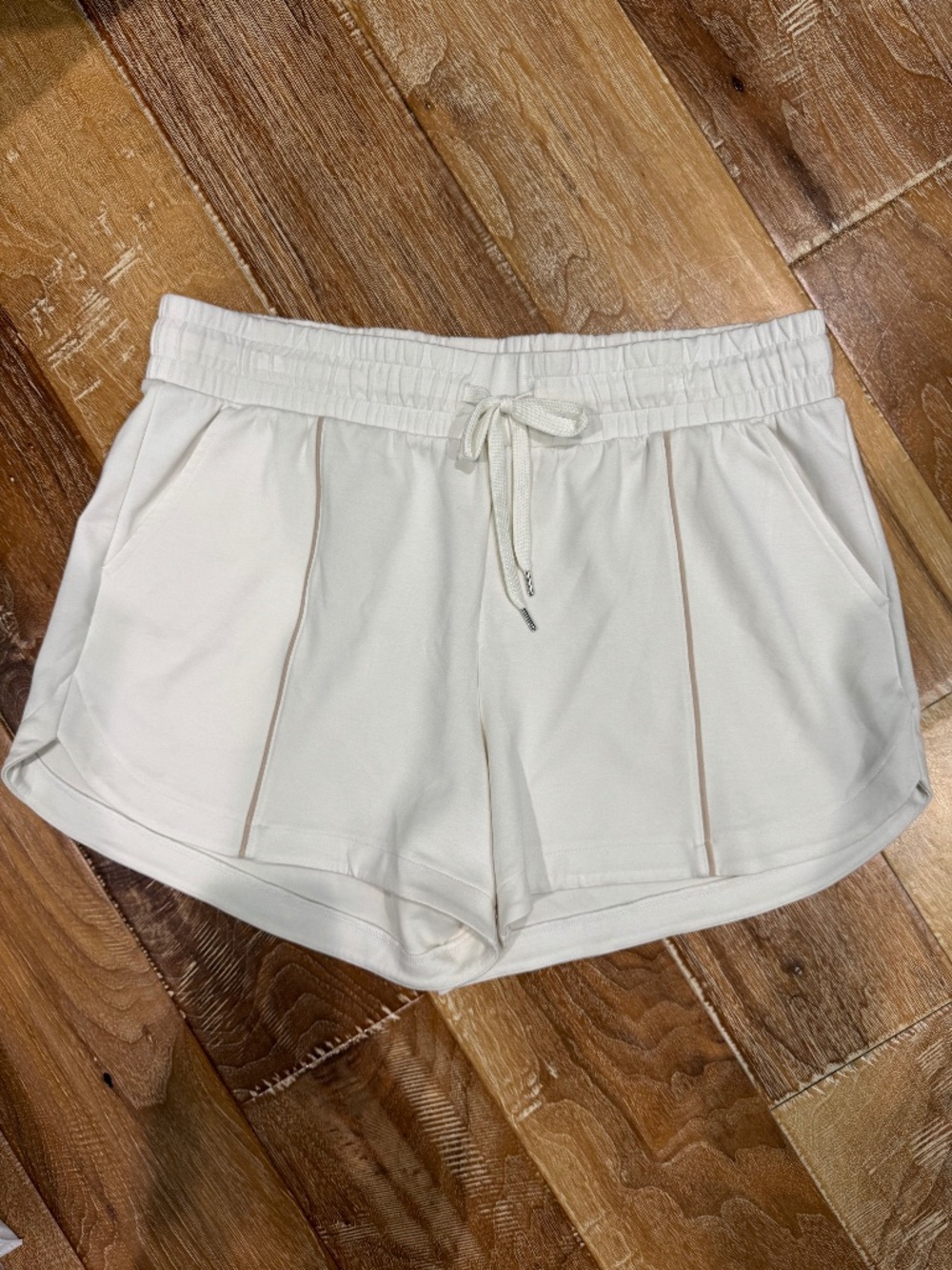 ID Ideology Women's High-Rise Relaxed Pull-On Shorts in soft cream/white LARGE